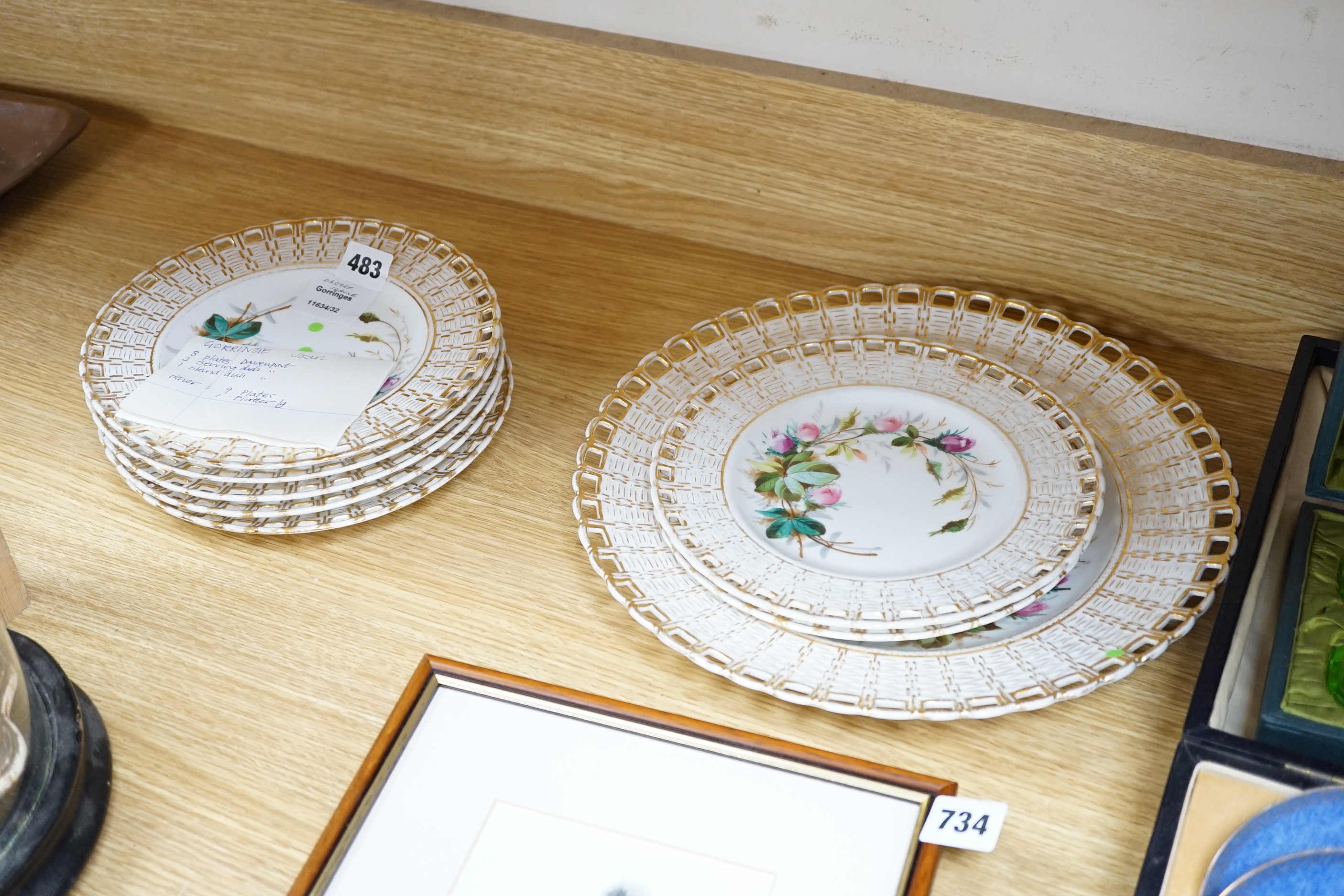 A set of nine French porcelain dessert dishes, painted with roses, and a larger, matching cake dish, (10)